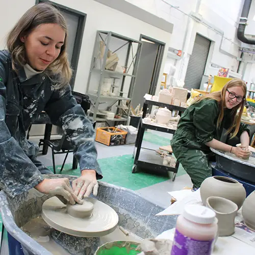 Art and Design Students creating pottery pieces