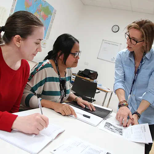 ESOL students with tutor