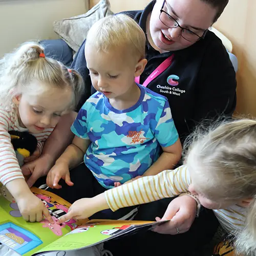 Early Years student reading a story